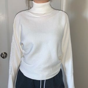 White turtleneck sweater